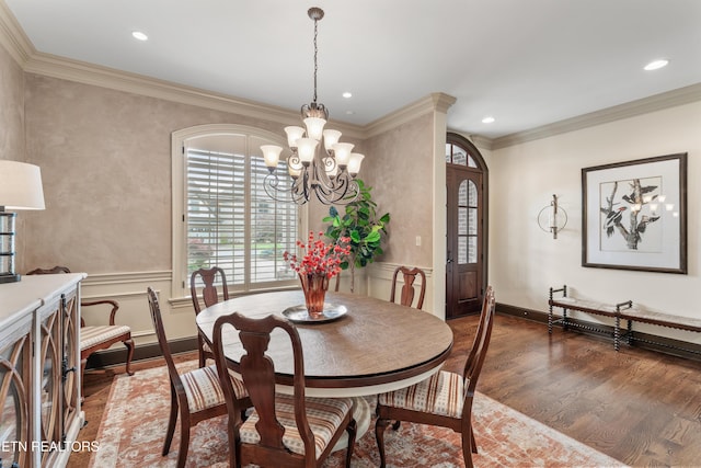12209 Preston Landing Way, Knoxville, TN 37922 - dining room with a chandelier, wood finished floors, ornamental molding, recessed lighting, and wainscoting
