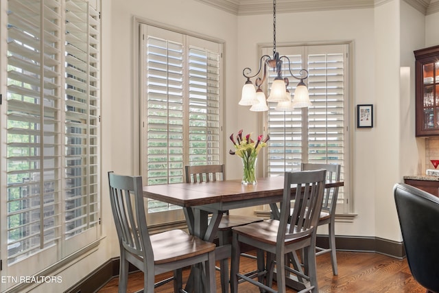 12209 Preston Landing Way, Knoxville, TN 37922 - dining room featuring a chandelier, healthy amount of natural light, crown molding, and wood finished floors