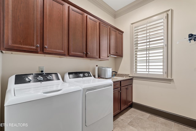 12209 Preston Landing Way, Knoxville, TN 37922 - laundry room featuring washing machine and dryer, cabinet space, and ornamental molding