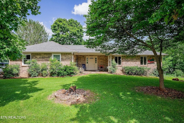 1790 Coon Hunt Rd, Baxter, TN 38544 - ranch-style house featuring brick siding and a front lawn