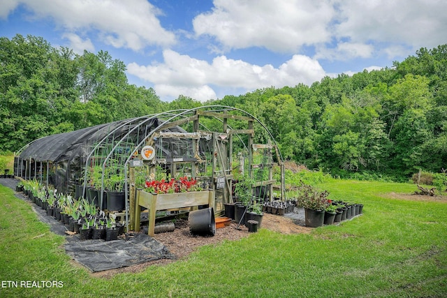1790 Coon Hunt Rd, Baxter, TN 38544 - view of greenhouse with a garden and a yard