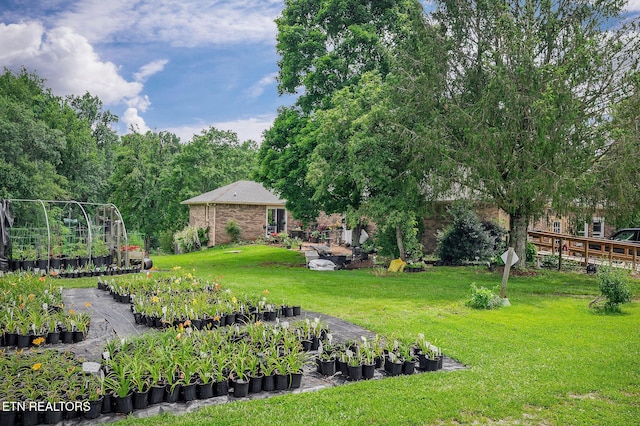 1790 Coon Hunt Rd, Baxter, TN 38544 - view of green lawn featuring a garden