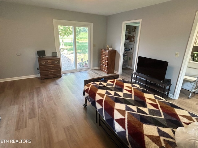 1790 Coon Hunt Rd, Baxter, TN 38544 - bedroom featuring wood finished floors and access to exterior