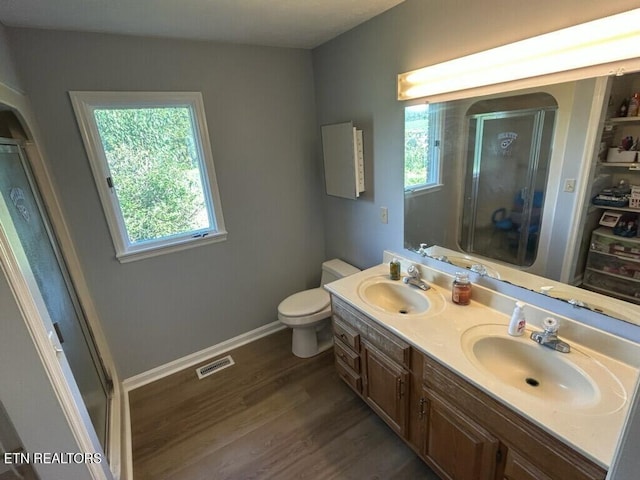 1790 Coon Hunt Rd, Baxter, TN 38544 - bathroom with wood finished floors, double vanity, and a stall shower