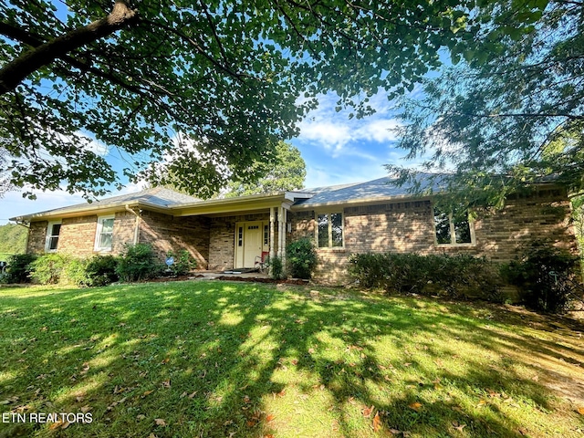 1790 Coon Hunt Rd, Baxter, TN 38544 - ranch-style home featuring a front yard and brick siding