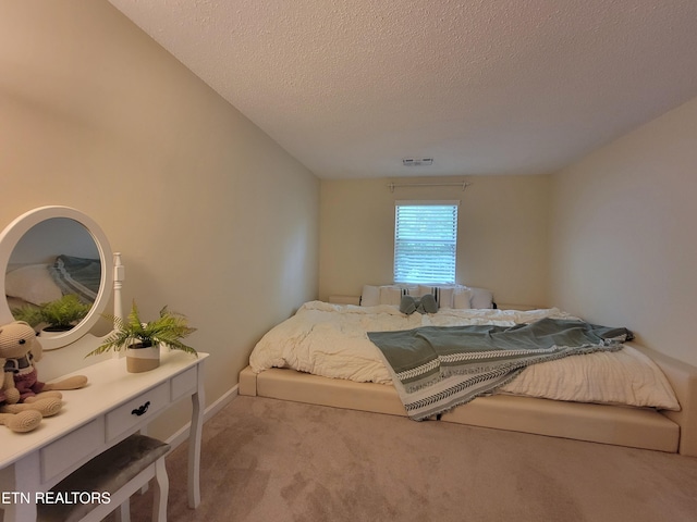237 Camelot Ct, Knoxville, TN 37922 - carpeted bedroom with a textured ceiling and baseboards