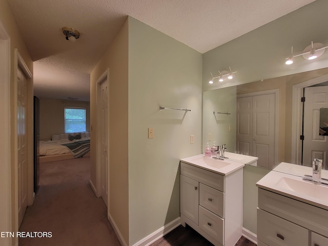 237 Camelot Ct, Knoxville, TN 37922 - full bathroom featuring two vanities and a textured ceiling