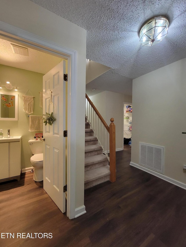 237 Camelot Ct, Knoxville, TN 37922 - stairs featuring wood finished floors and a textured ceiling
