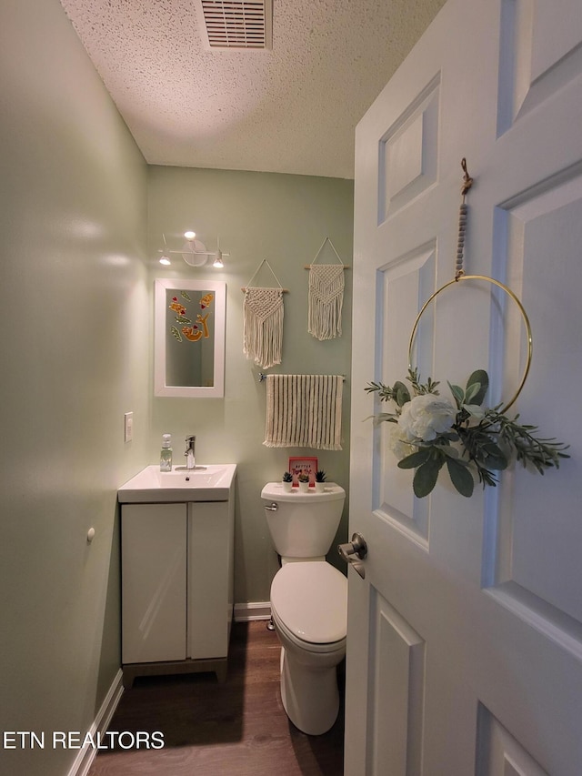 237 Camelot Ct, Knoxville, TN 37922 - half bathroom with wood finished floors, a textured ceiling, and vanity