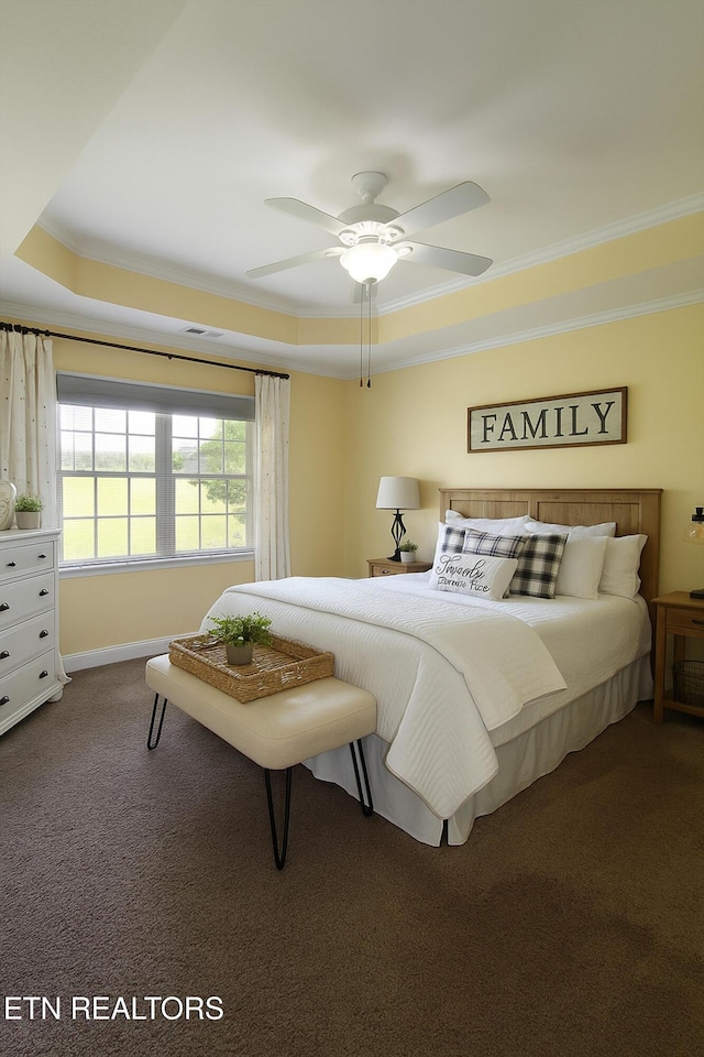 122 Dayflower Way, Maynardville, TN 37807 - bedroom with crown molding, dark carpet, a tray ceiling, and a ceiling fan