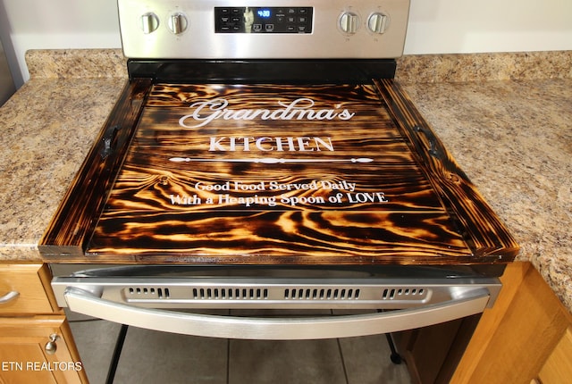 122 Dayflower Way, Maynardville, TN 37807 - kitchen view of stainless steel gas range and light stone counters