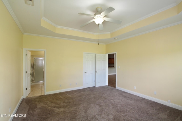 122 Dayflower Way, Maynardville, TN 37807 - unfurnished bedroom featuring carpet, crown molding, a tray ceiling, and ensuite bathroom