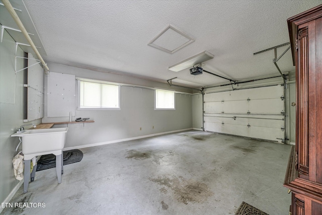 7000 Big Horn Dr Unit C-11, Crossville, TN 38572 - garage with a garage door opener and baseboards