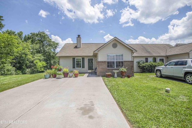 5632 Libby Way, Knoxville, TN 37924 - ranch-style home with brick siding, a front lawn, and a chimney