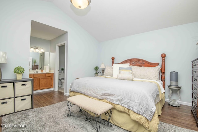 5632 Libby Way, Knoxville, TN 37924 - bedroom featuring dark wood finished floors, vaulted ceiling, and ensuite bath
