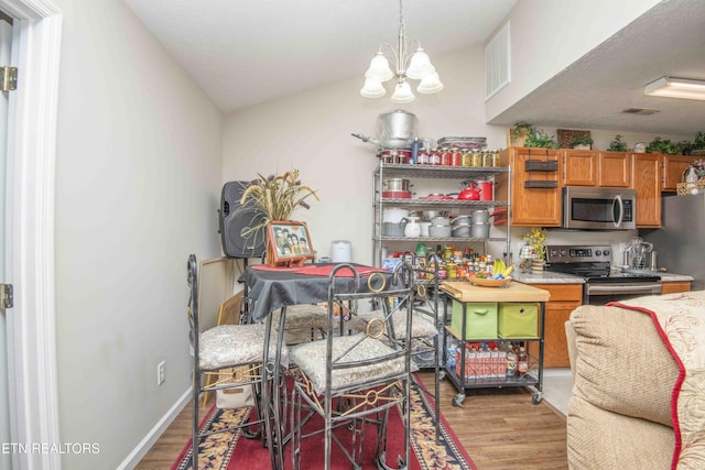 5632 Libby Way, Knoxville, TN 37924 - dining area featuring light wood-type flooring and a chandelier