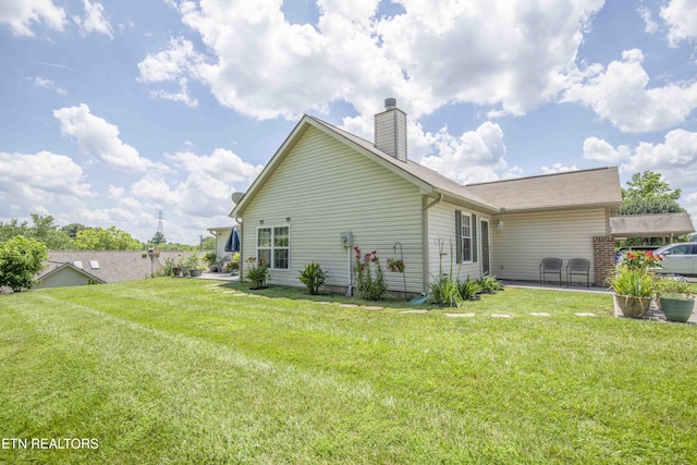 5632 Libby Way, Knoxville, TN 37924 - rear view of property with a patio area, a lawn, and a chimney