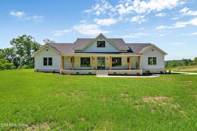 320 Ridge Ln, Monterey, TN 38574 - modern inspired farmhouse with board and batten siding, roof with shingles, covered porch, and a front lawn