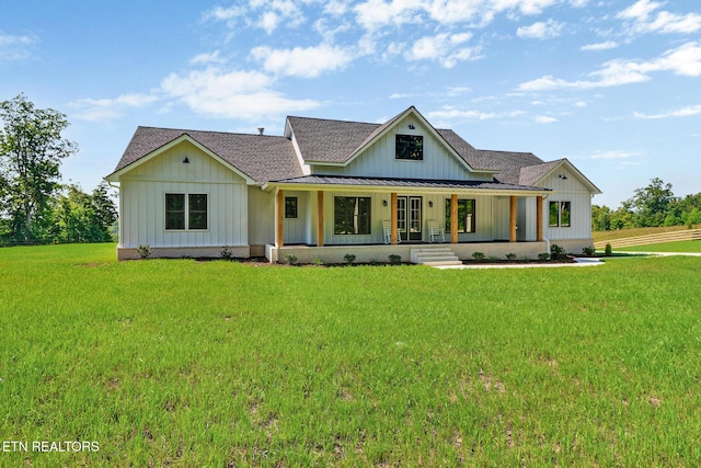 320 Ridge Ln, Monterey, TN 38574 - modern inspired farmhouse with a porch, roof with shingles, a standing seam roof, and a front lawn