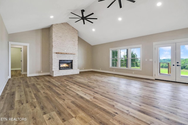 320 Ridge Ln, Monterey, TN 38574 - unfurnished living room featuring a ceiling fan, lofted ceiling, wood finished floors, french doors, and recessed lighting