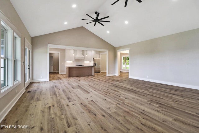 320 Ridge Ln, Monterey, TN 38574 - unfurnished living room with a ceiling fan, light wood-style flooring, recessed lighting, and high vaulted ceiling