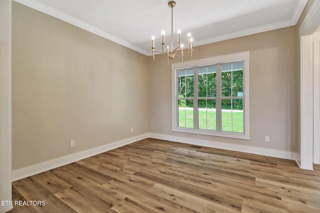 320 Ridge Ln, Monterey, TN 38574 - unfurnished room featuring a chandelier, ornamental molding, and wood finished floors