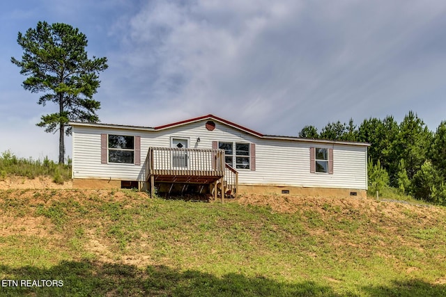 6952 Cottonport Rd, Decatur, TN 37322 - rear view of house with crawl space, a deck, and a lawn