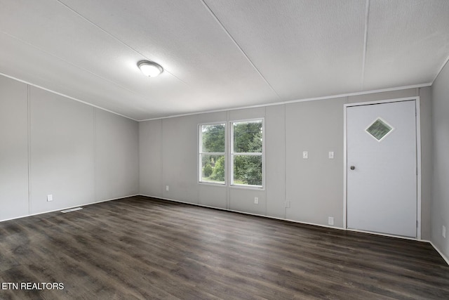 6952 Cottonport Rd, Decatur, TN 37322 - spare room featuring dark wood-style flooring and a textured ceiling