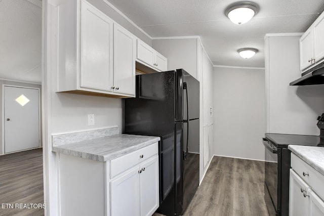 6952 Cottonport Rd, Decatur, TN 37322 - kitchen featuring black appliances, wood finished floors, crown molding, white cabinetry, and light countertops