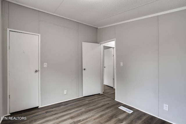 6952 Cottonport Rd, Decatur, TN 37322 - unfurnished bedroom featuring wood finished floors