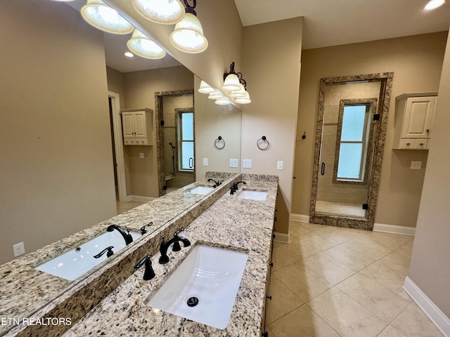 2005 River Mist Cir, New Market, TN 37820 - full bath featuring double vanity, a stall shower, plenty of natural light, and tile patterned flooring