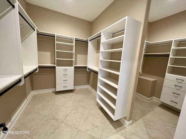 2005 River Mist Cir, New Market, TN 37820 - walk in closet featuring light marble finish floors