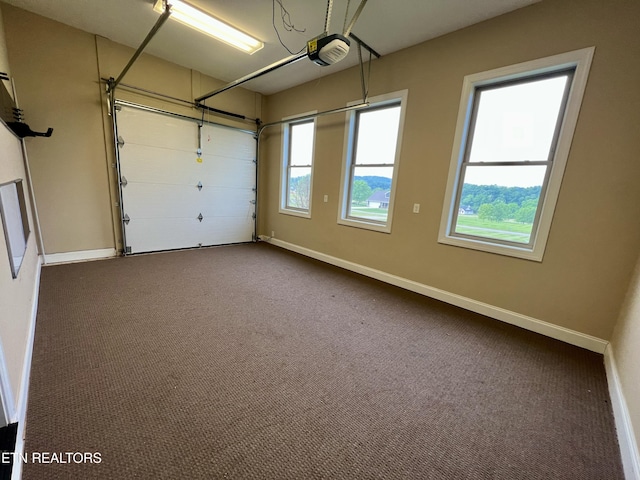 2005 River Mist Cir, New Market, TN 37820 - garage with baseboards and a garage door opener