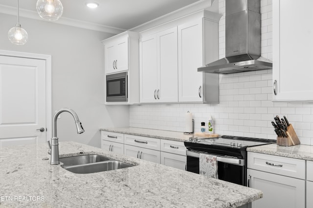 402 Sycamore Pl, Loudon, TN 37774 - kitchen with wall chimney range hood, stainless steel appliances, ornamental molding, white cabinets, and tasteful backsplash