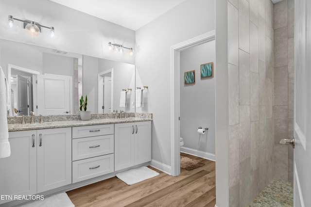 402 Sycamore Pl, Loudon, TN 37774 - full bath featuring double vanity, wood finished floors, and tiled shower