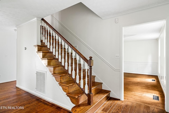 824 W Woodchase Rd, Knoxville, TN 37934 - stairway with wood-type flooring and crown molding