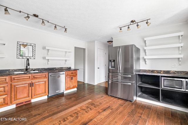 824 W Woodchase Rd, Knoxville, TN 37934 - kitchen with open shelves, appliances with stainless steel finishes, track lighting, ornamental molding, and a textured ceiling