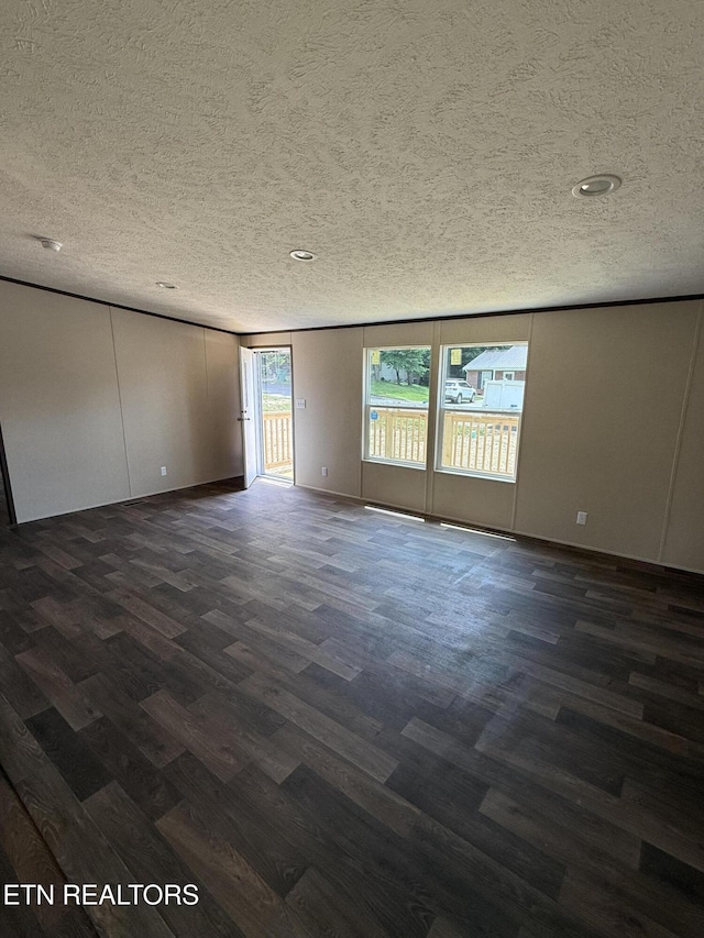 1684 Shields Dr, Morristown, TN 37814 - unfurnished room with dark wood finished floors, a textured ceiling, and recessed lighting