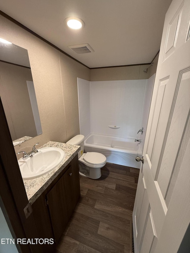 1684 Shields Dr, Morristown, TN 37814 - full bathroom featuring vanity, washtub / shower combination, and wood finished floors