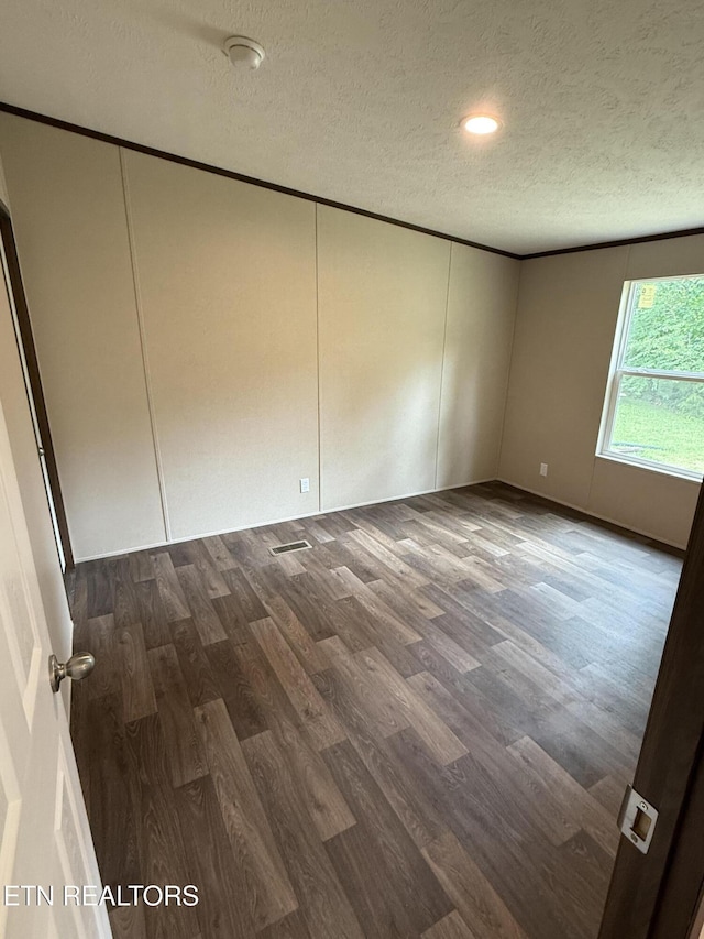 1684 Shields Dr, Morristown, TN 37814 - spare room with a textured ceiling, dark wood-style floors, and recessed lighting