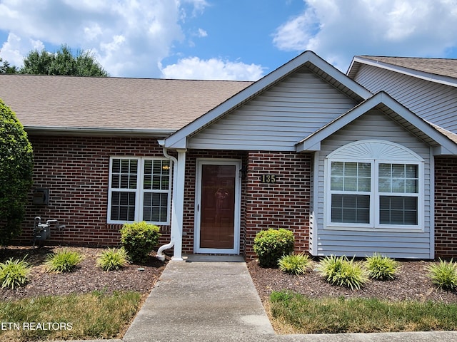 715 Cedar Ln Unit 135, Knoxville, TN 37912 - property entrance with brick siding and a shingled roof