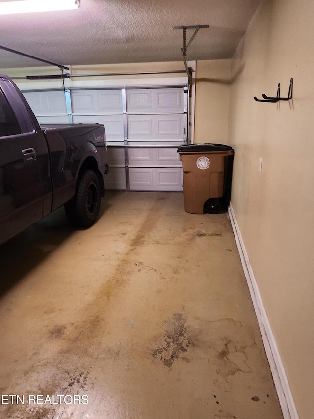 715 Cedar Ln Unit 135, Knoxville, TN 37912 - garage with baseboards