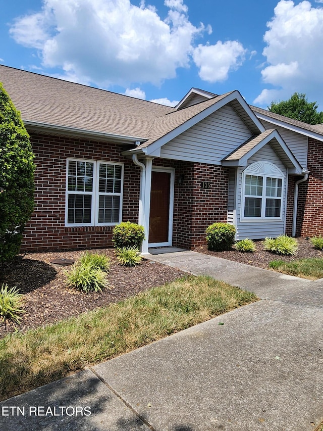 715 Cedar Ln Unit 135, Knoxville, TN 37912 - ranch-style home featuring brick siding and a shingled roof