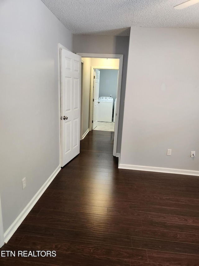 715 Cedar Ln Unit 135, Knoxville, TN 37912 - empty room with wood finished floors, independent washer and dryer, and a textured ceiling