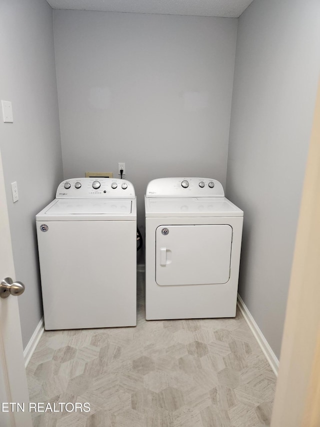 715 Cedar Ln Unit 135, Knoxville, TN 37912 - laundry room with separate washer and dryer and light floors