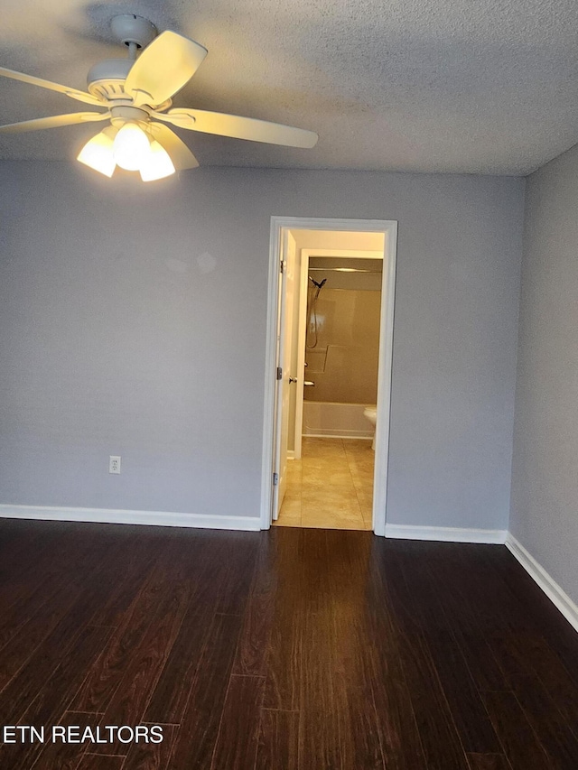 715 Cedar Ln Unit 135, Knoxville, TN 37912 - unfurnished room with a ceiling fan, wood finished floors, and a textured ceiling
