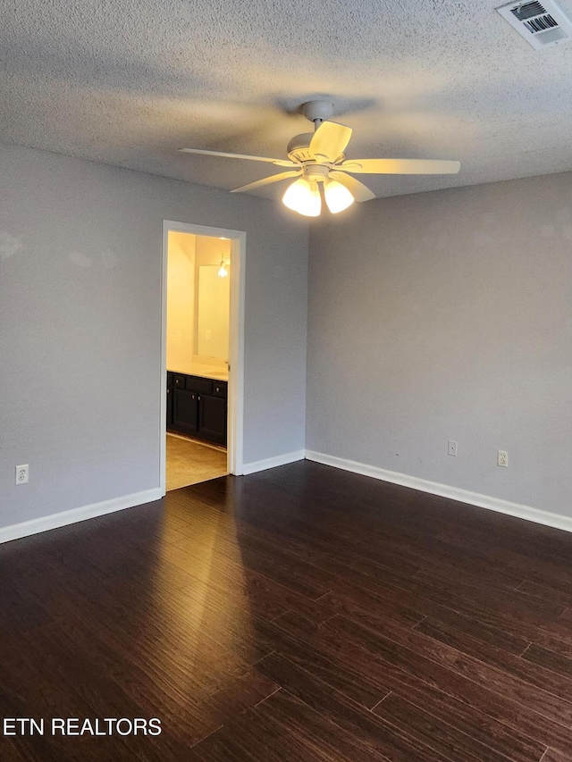 715 Cedar Ln Unit 135, Knoxville, TN 37912 - unfurnished room with ceiling fan, wood finished floors, and a textured ceiling