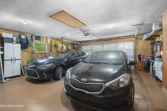 122 Glenwood Dr, Crossville, TN 38555 - garage with a garage door opener