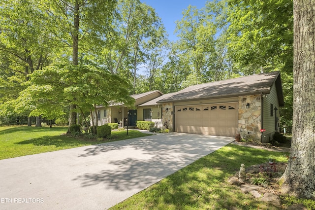 122 Glenwood Dr, Crossville, TN 38555 - view of front of property featuring stone siding, a garage, driveway, and a front lawn