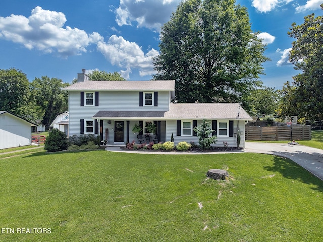 1839 Plumb Creek Cir, Knoxville, TN 37932 - traditional-style house with a chimney, a porch, and driveway